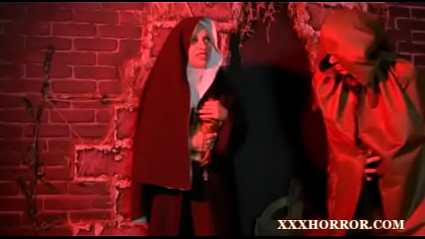 Nun pissing on cross scene