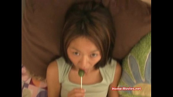 Petite asian sucking a lollipop scene