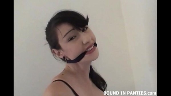 Lesbian gagged in the cage scene